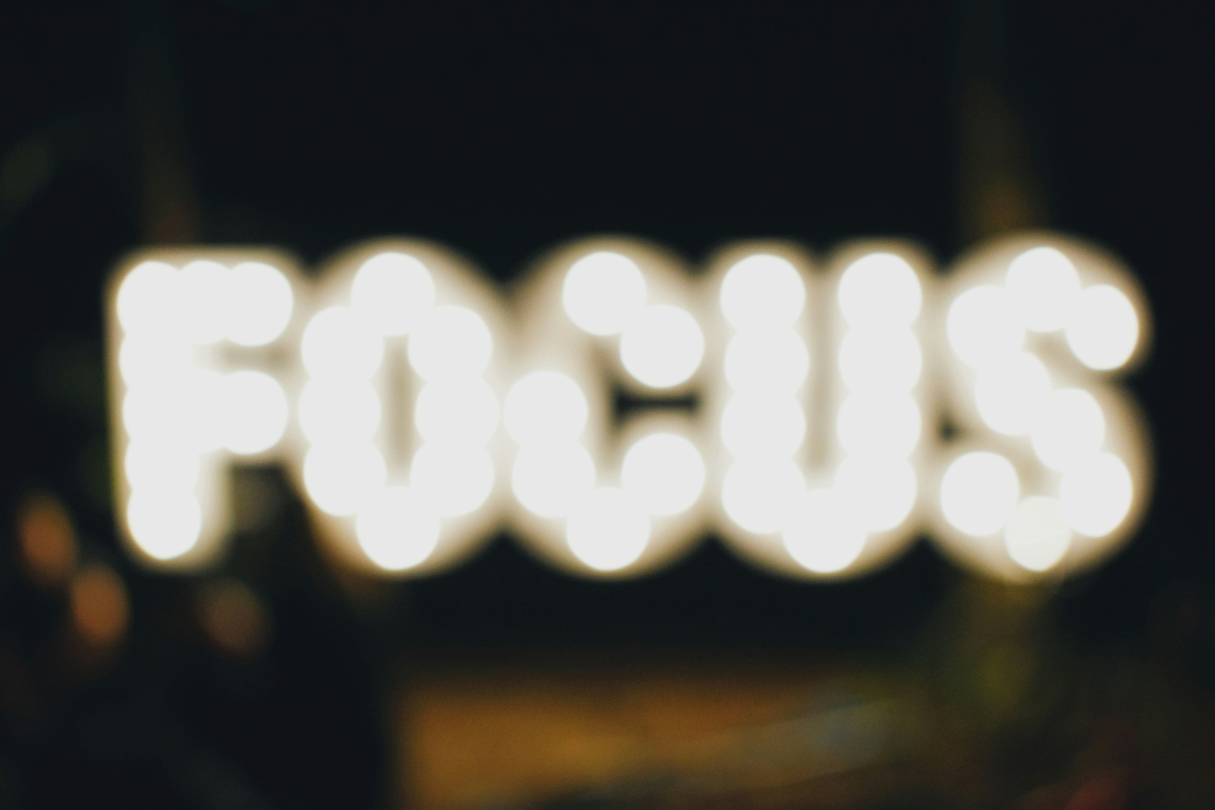 Blurry image of the words focus