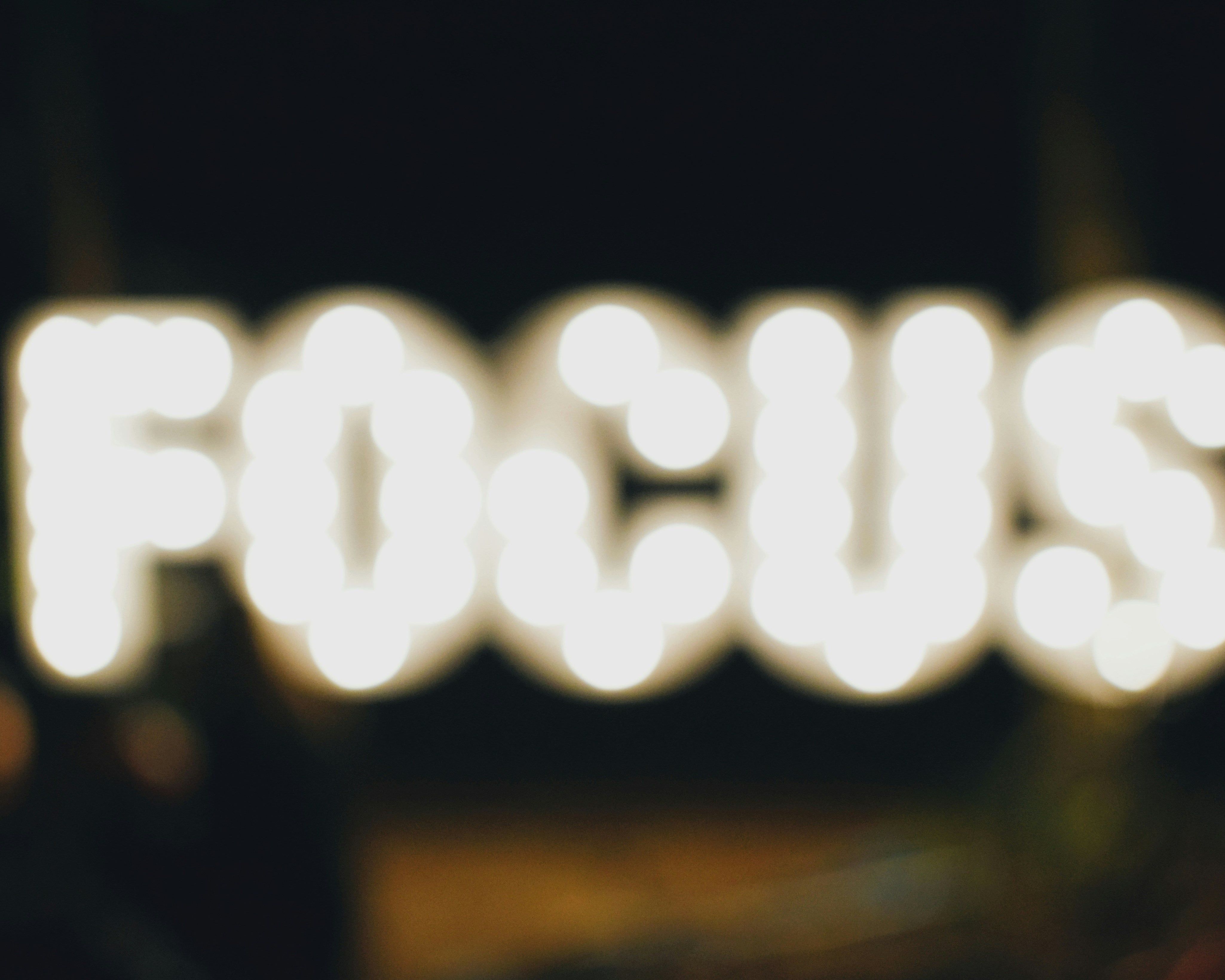 Blurry image of the words focus