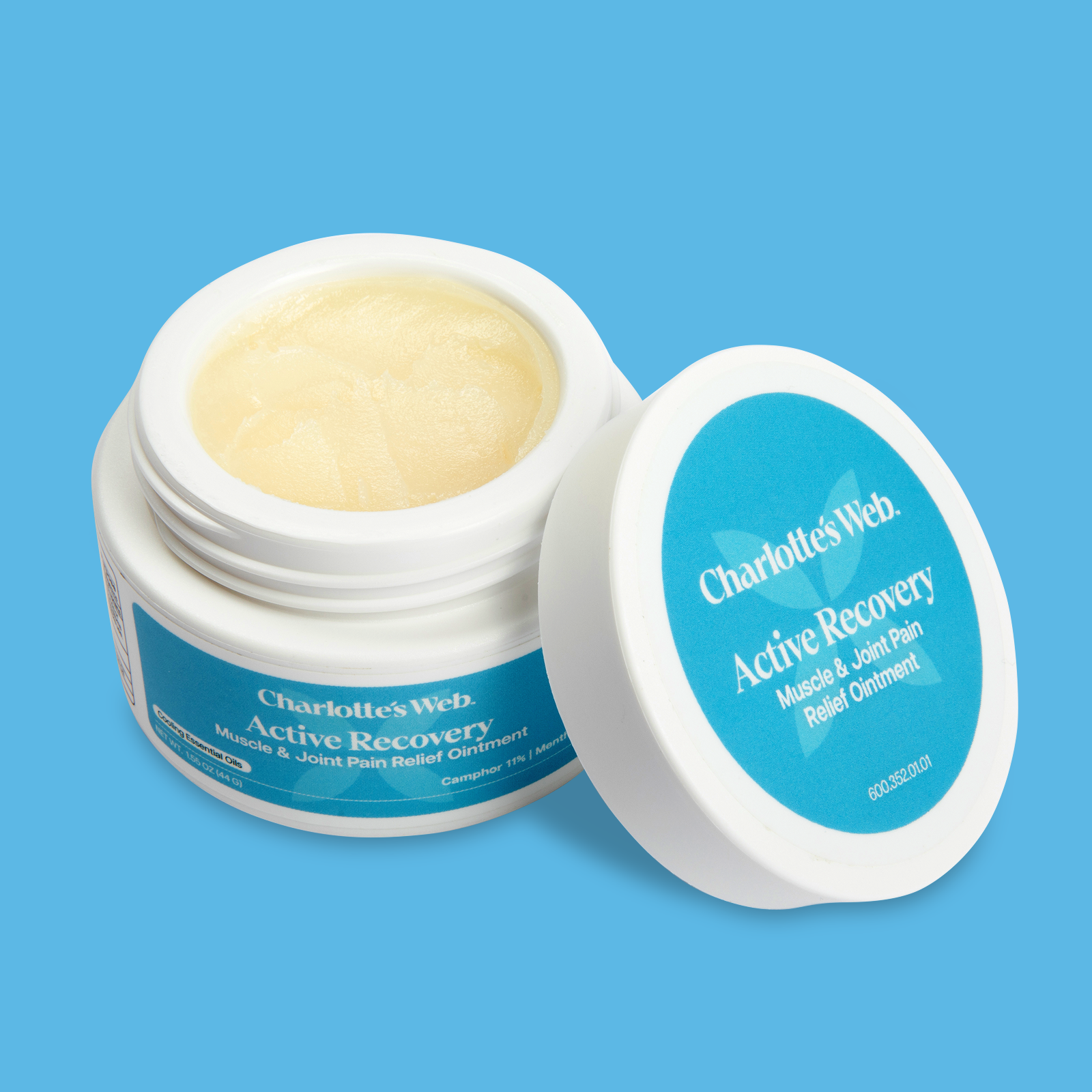 Product Image for Open jar of Charlotte's Web Active Recovery Muscle &amp; Joint Pain Relief Ointment on a blue background