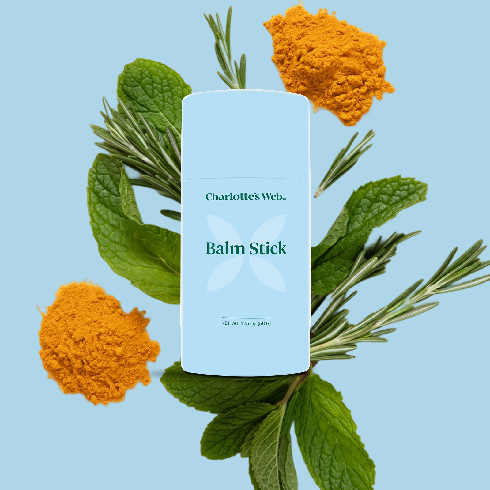 Product Image for Charlotte's Web Balm Stick surrounded by mint leaves, rosemary, and turmeric powder on a blue background