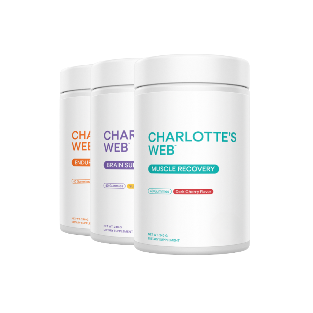 Three containers of Charlotte's Web supplements on a white background