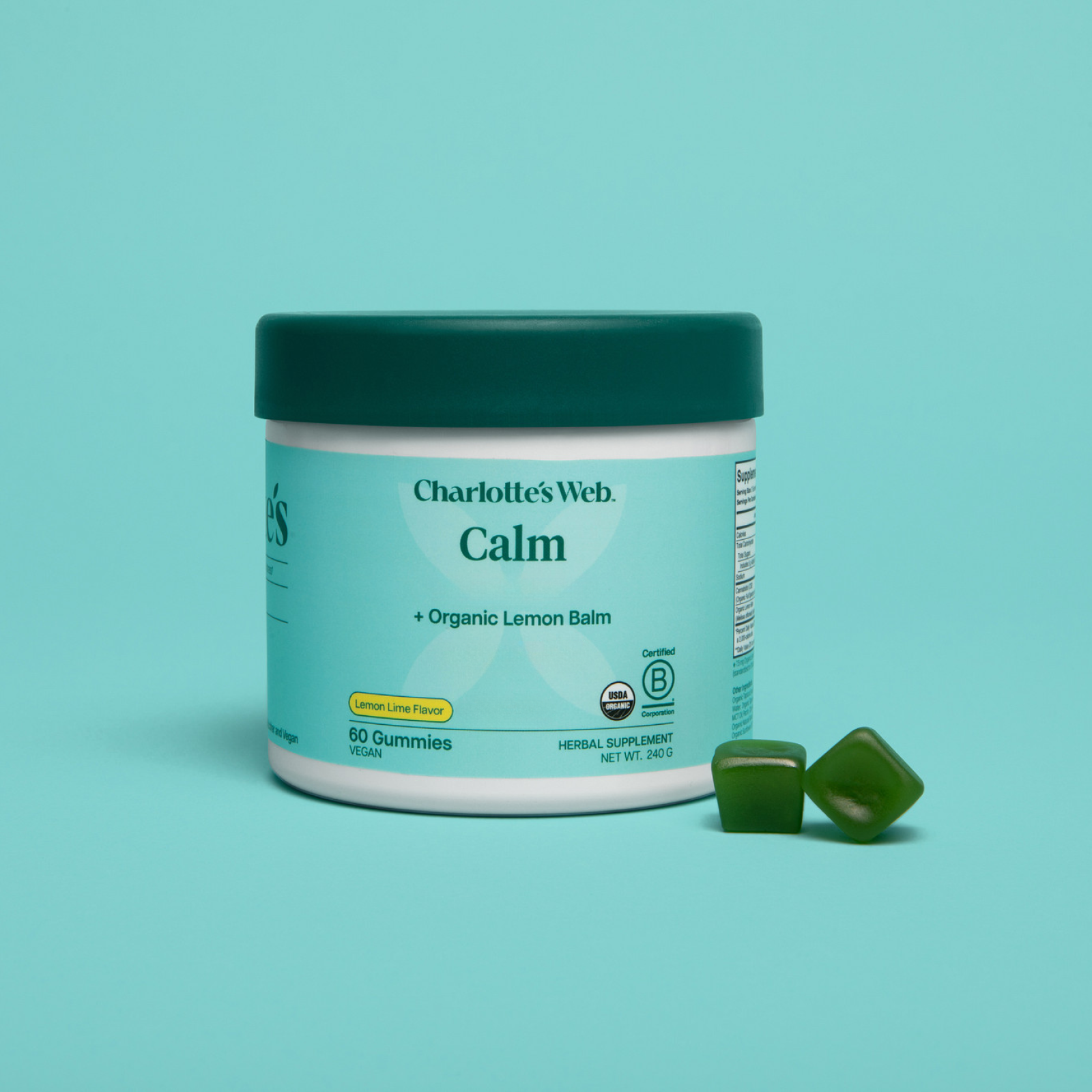 Product Image for Jar of Charlotte&#39;s Web Calm gummies with a green lid on a teal background