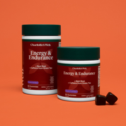Product Image for Two containers of Charlotte&#39;s Web Energy &amp; Endurance gummies on an orange background