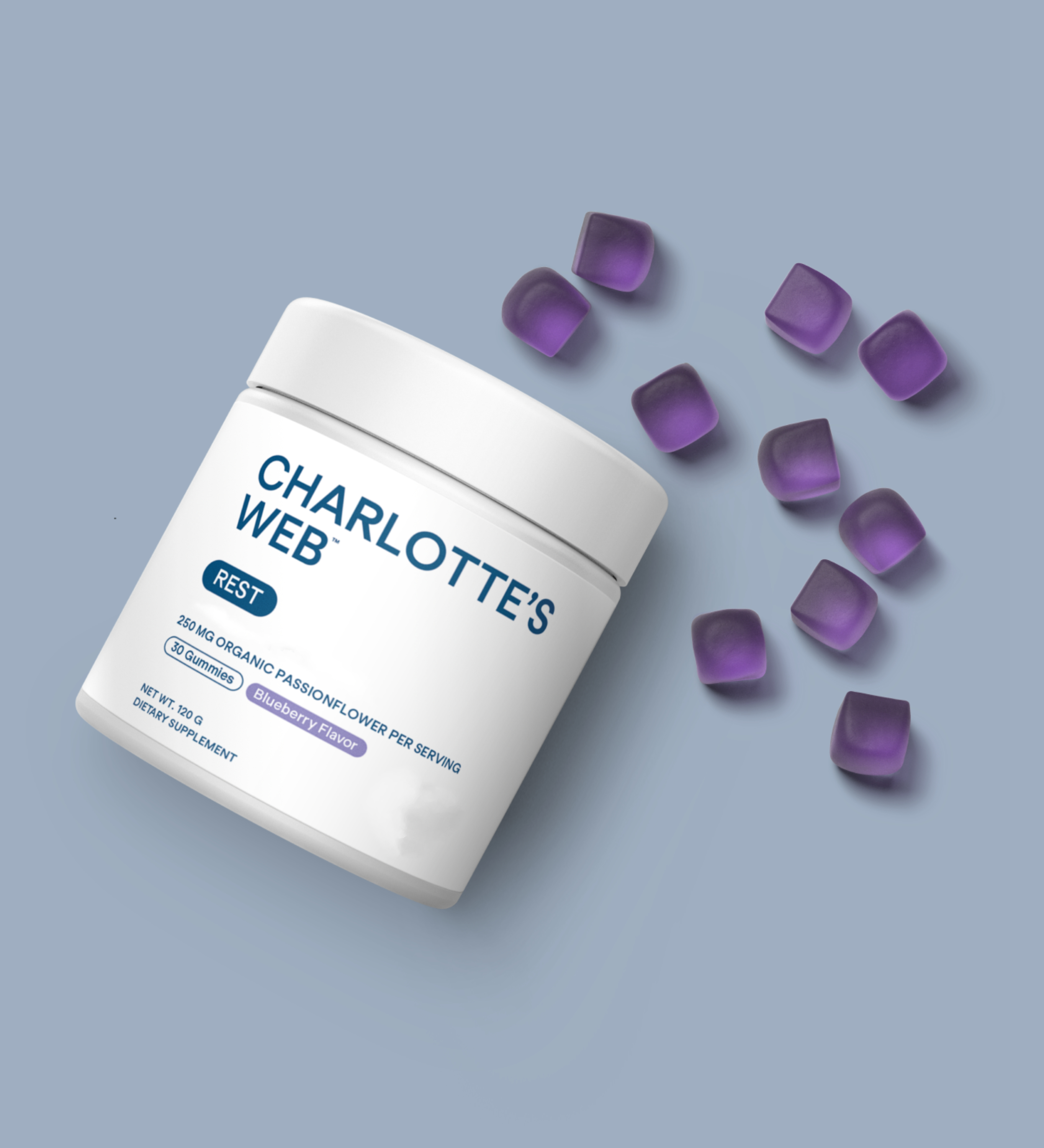 Charlotte's Web Rest CBD Gummies container with purple gummies on a soft blue background, highlighting passionflower ingredient.