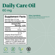 Product Image for A supplement facts label for Daily Care Oil 60 mg, shown on a muted green background with product name, other ingredients, and certification icons for gluten-free, non-GMO, vegan, and kosher.