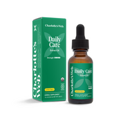 Product Image for Charlotte&#39;s Web Daily Care Extract Oil bottle and packaging on a white background