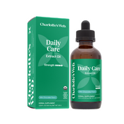 Product Image for Charlotte&#39;s Web Daily Care Extract Oil bottle and packaging on a white background