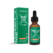 Product Image for Charlotte&#39;s Web Daily Care Extract Oil bottle and packaging on a white background