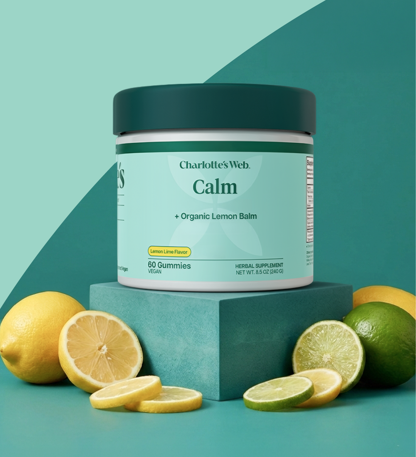 Charlotte's Web Calm gummies with 25mg of broad-spectrum hemp on a teal background with lemon and limes