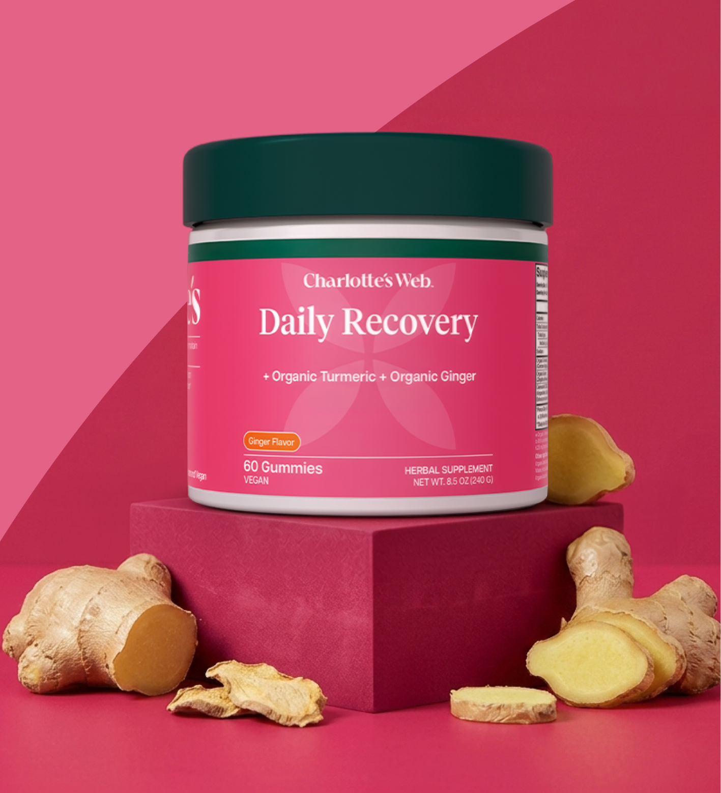 Daily Recovery 25 mg broad spectrum hemp gummies with ginger pieces on a pink background