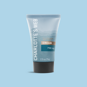 Product Image for Tube of Charlotte&#39;s Web cream on a light blue background