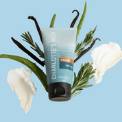 Product Image for Tube of Charlotte&#39;s Web cream with vanilla beans and rosemary on a light blue background