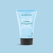 Product Image for Charlotte's Web Cream on a light blue background