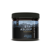 Product Image for Charlotte’s Web Stay Asleep gummies container with huckleberry flavor, blue-black mountain label, 20 mg CBN per serving, 60-count dietary supplement.