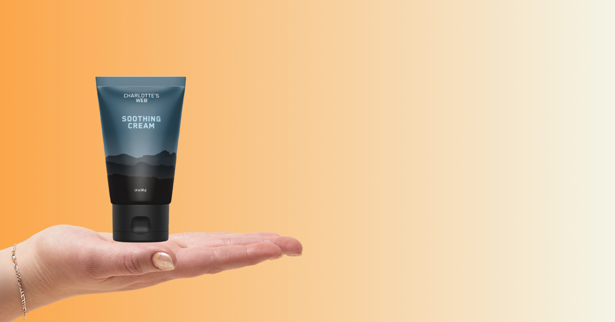 Charlotte Web Soothing Cream against a warm orange-to-cream gradient background.