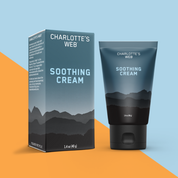 Product Image for Charlotte's Web Soothing Cream tube on a diagonal background split between light blue and orange.